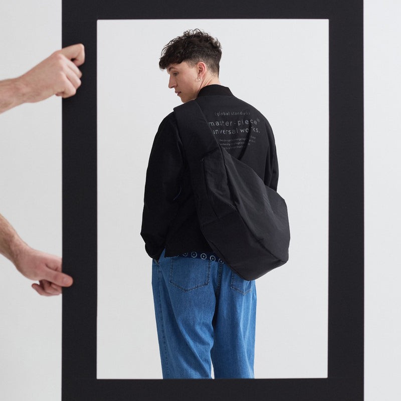 Worn, not carried. master-piece x Universal Works.