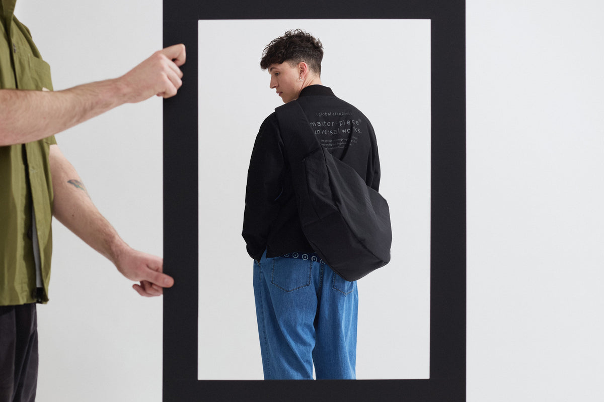 Worn, not carried. master-piece x Universal Works.