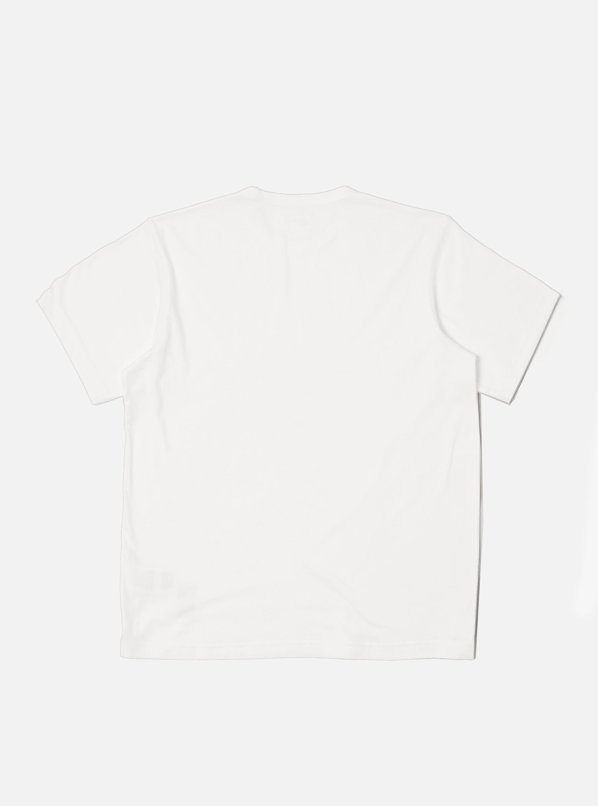 The Ecru Single Jersey Core Tee is displayed on a white background. The tee is a light, off-white color and appears to be made of a soft, jersey material.