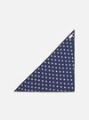 The Navy Bold Dot Print Rayon Scout Scarf on a white background. The scarf is navy with white dots and a black trim.