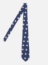 The Navy Bold Dot Print Rayon Tie is displayed on a white background. The tie is navy with white dots. The tie is made of rayon.