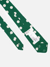 The Forest Green Bold Dot Print Rayon Tie is shown in a close-up detail shot as a flat lay against a plain white background. The image focuses on the central part of the tie, highlighting the intricate bold dot pattern and the smooth texture of the forest green rayon fabric.