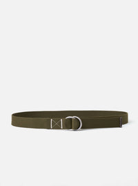 The Olive Canvas Webbing O Ring Belt is shown as a flat lay against a white background. The belt is made of a woven olive green canvas material and features two silver-tone metal O-rings at one end for an adjustable closure. Contrast stitching is visible along the strap.