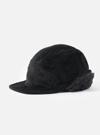 The cableami® Black Corduroy 5w Cap on a white background. The cap is black corduroy with a short brim and ear flaps.