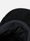 Close-up of the inside of the cableami® Black Corduroy 5w Cap, showing the quilted lining and corduroy texture against a plain white background.