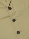 Close-up of the sand twill London jacket, showcasing its textured fabric and button details. The jacket is laid flat on a neutral surface.