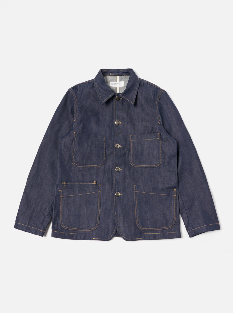 The Indigo 13oz Selvedge Denim Bakers Jacket is displayed on a white background. The jacket is a dark wash denim with four front pockets and button closure.