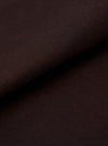 A detailed, close-up fabric swatch of the Brown Twill Three Button Jacket shows the intricate diagonal weave of the brown cotton material. The image highlights the texture and uniform earthy tone of the fabric against a neutral background.