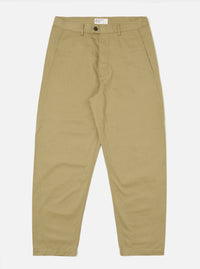 The Sand Twill Curved Pant in sand color, laid flat on a white background. The pants are made of twill fabric and have a curved fit.