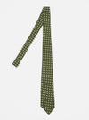The Olive Dot Print Tie is displayed on a white background. The tie is olive green with small white dots. The tie is made of silk and has a classic fit.
