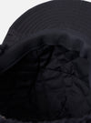 Close-up of the inside of a cableami® Black Military Nylon Twill Cap, showing the quilted lining and twill material. Shot on a white background.