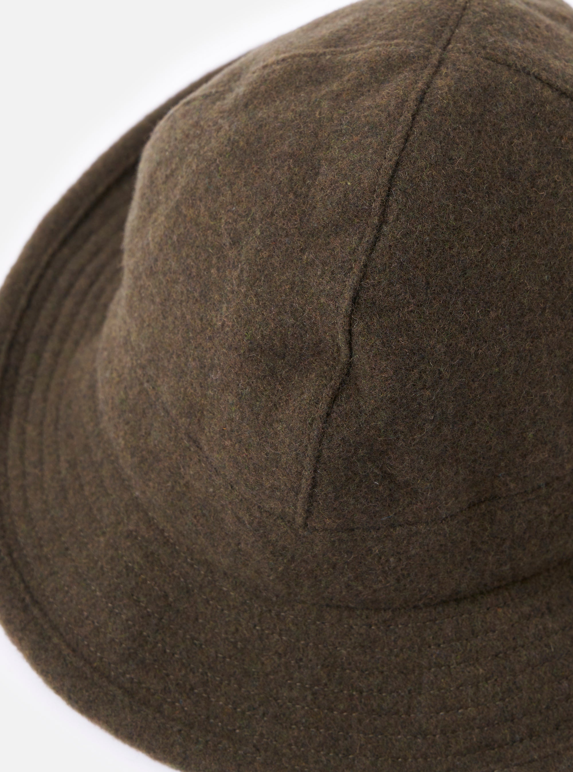 Close-up of the cableami® Olive Recycled Wool Army Hat on a white background. The olive green hat shows the texture of the recycled wool.