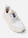 The Flower Mountain White/Off White Suede/Nylon Yamano 3 Uni sneaker is shown from a side profile as a flat lay against a plain white background. The design features a multi-layered upper with white nylon and off-white suede overlays, distinctive flower-shaped perforations on the side, and cream-colored trekking laces with reinforced leather eyelets. The shoe is finished with a chunky, toothed rubber sole in a tonal off-white shade.
