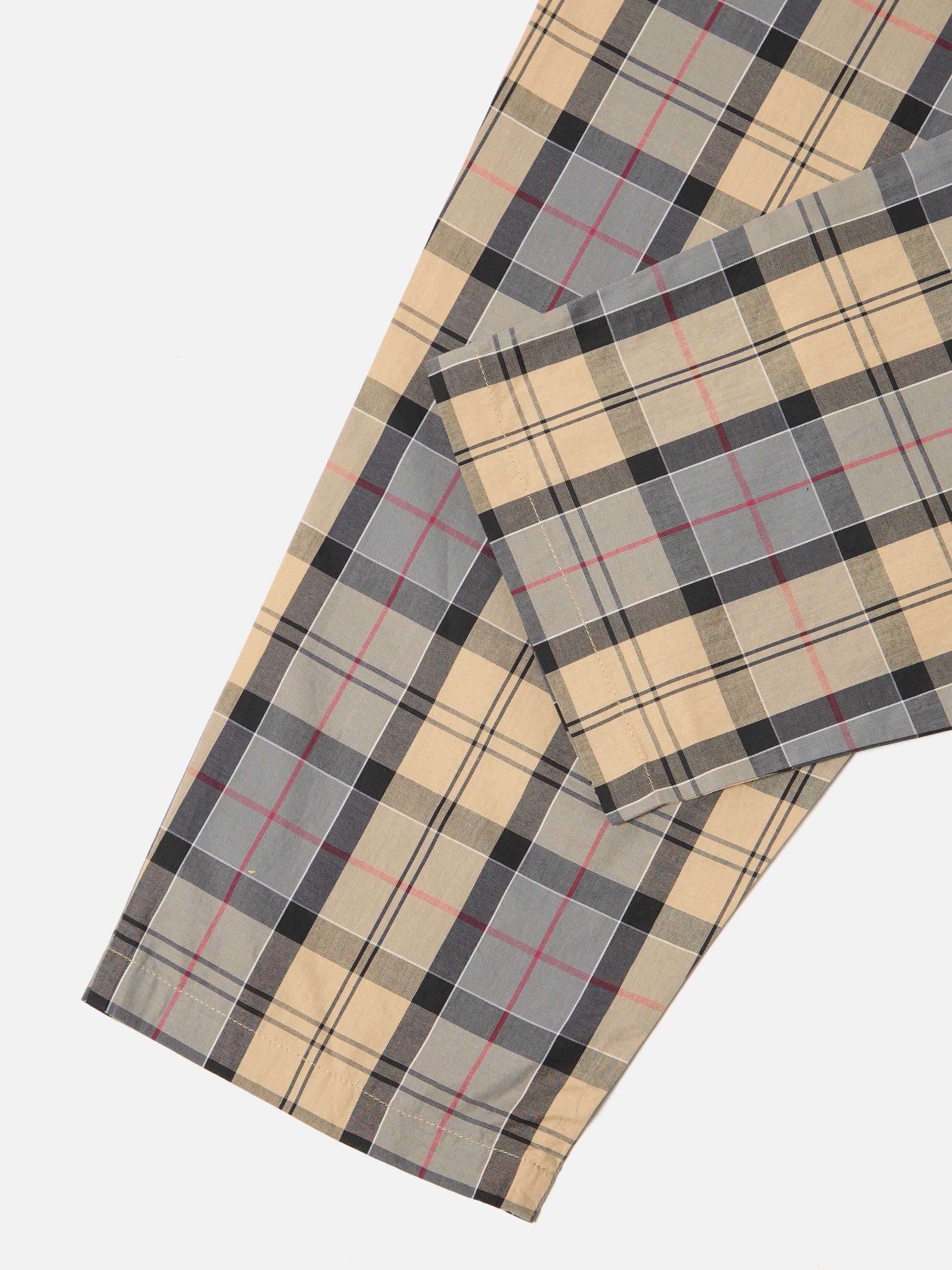 Close-up of the Sand Tartan Check Pyjama Pant on a white background. The fabric features a sand, gray, black, and red tartan pattern.