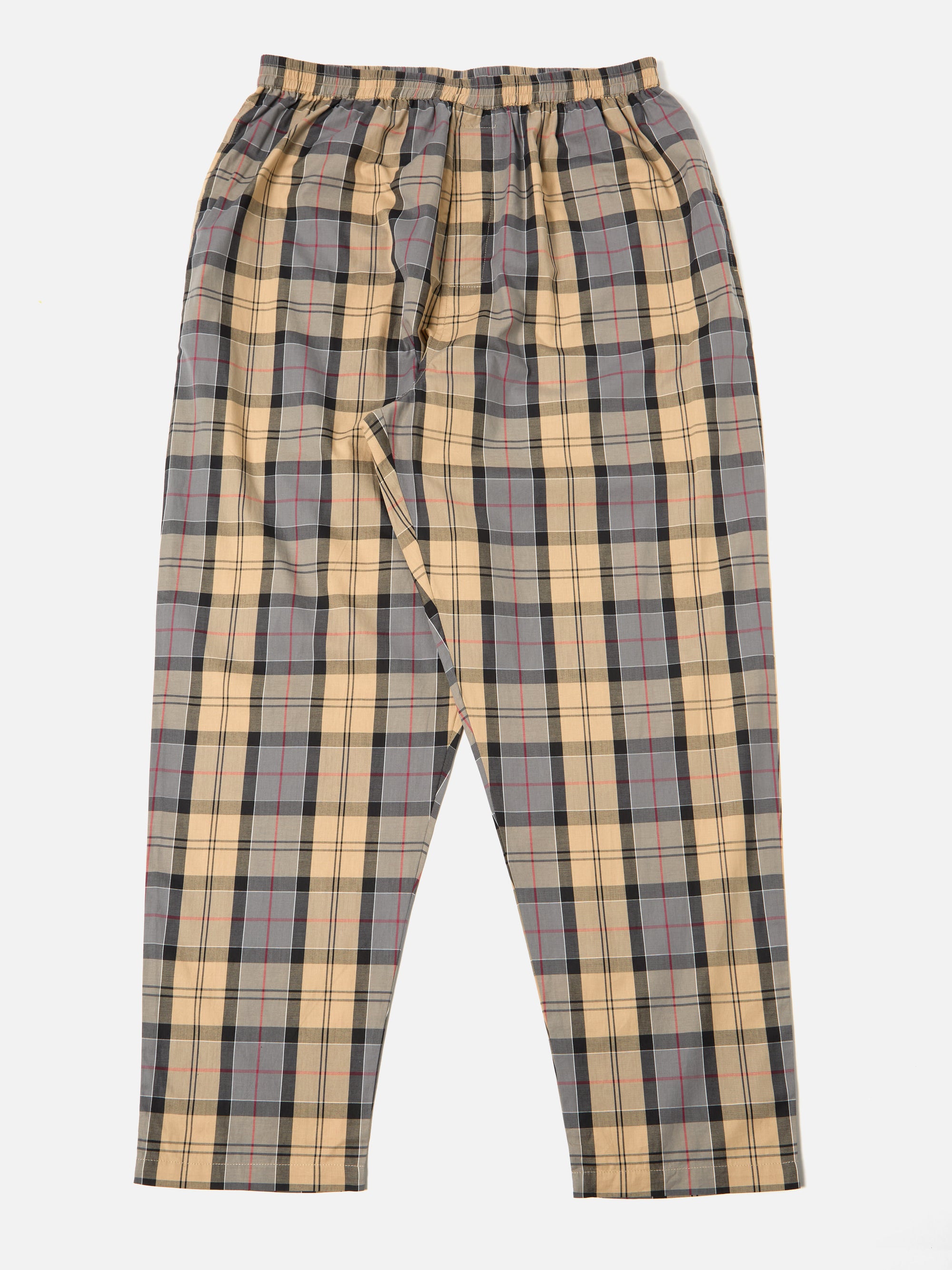 The Sand Tartan Check Pyjama Pant on a white background. The pants have a sand, gray, black, and red tartan pattern. The fit is loose and comfortable.