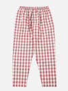 The Red Cotton Check Pyjama Pant, laid flat on a white background. The pyjama pants are red and white with an elastic waist.