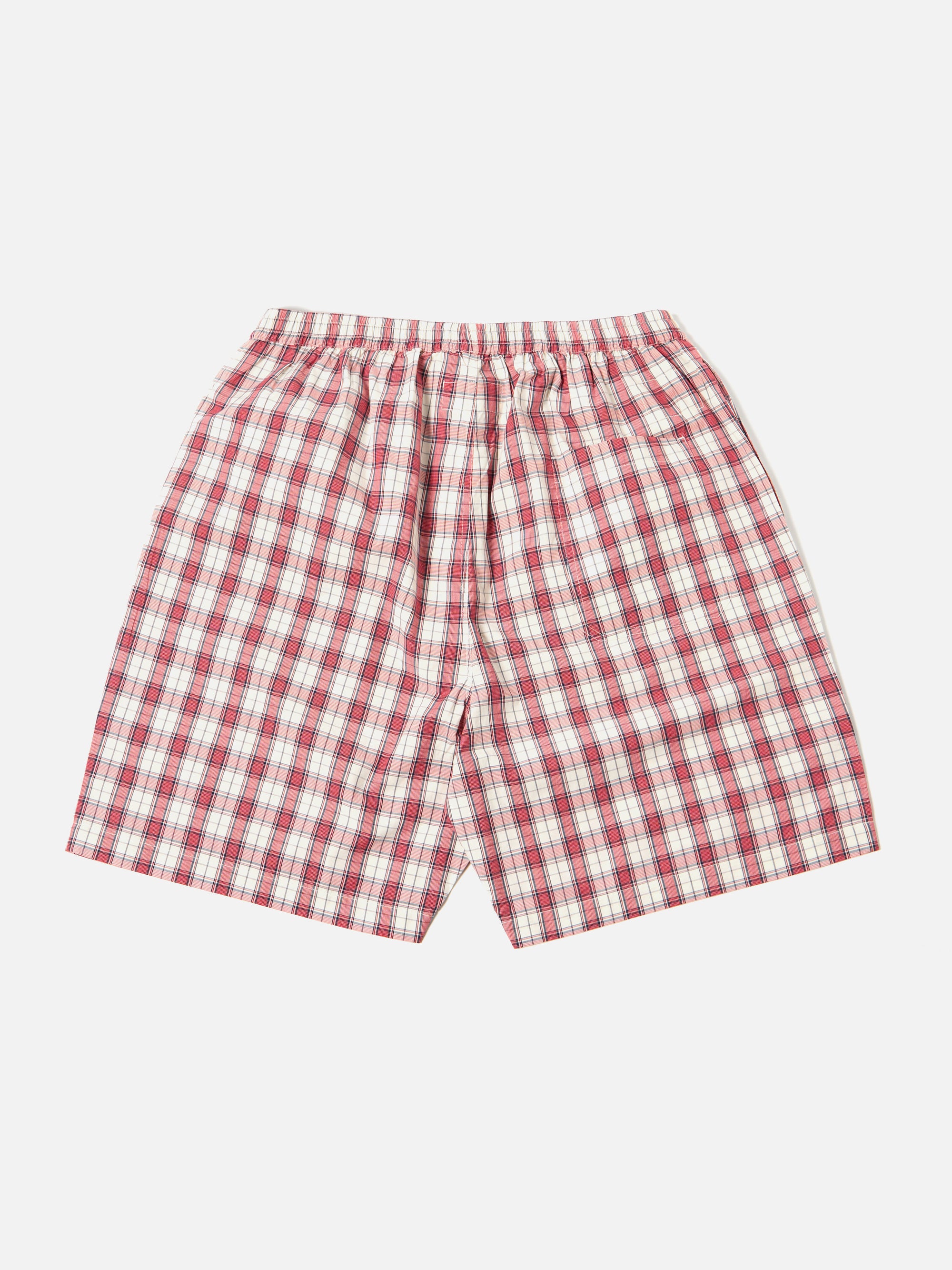The Red Cotton Check Pyjama Short, laid flat on a white background. The shorts are red and white check, with an elasticated waist.