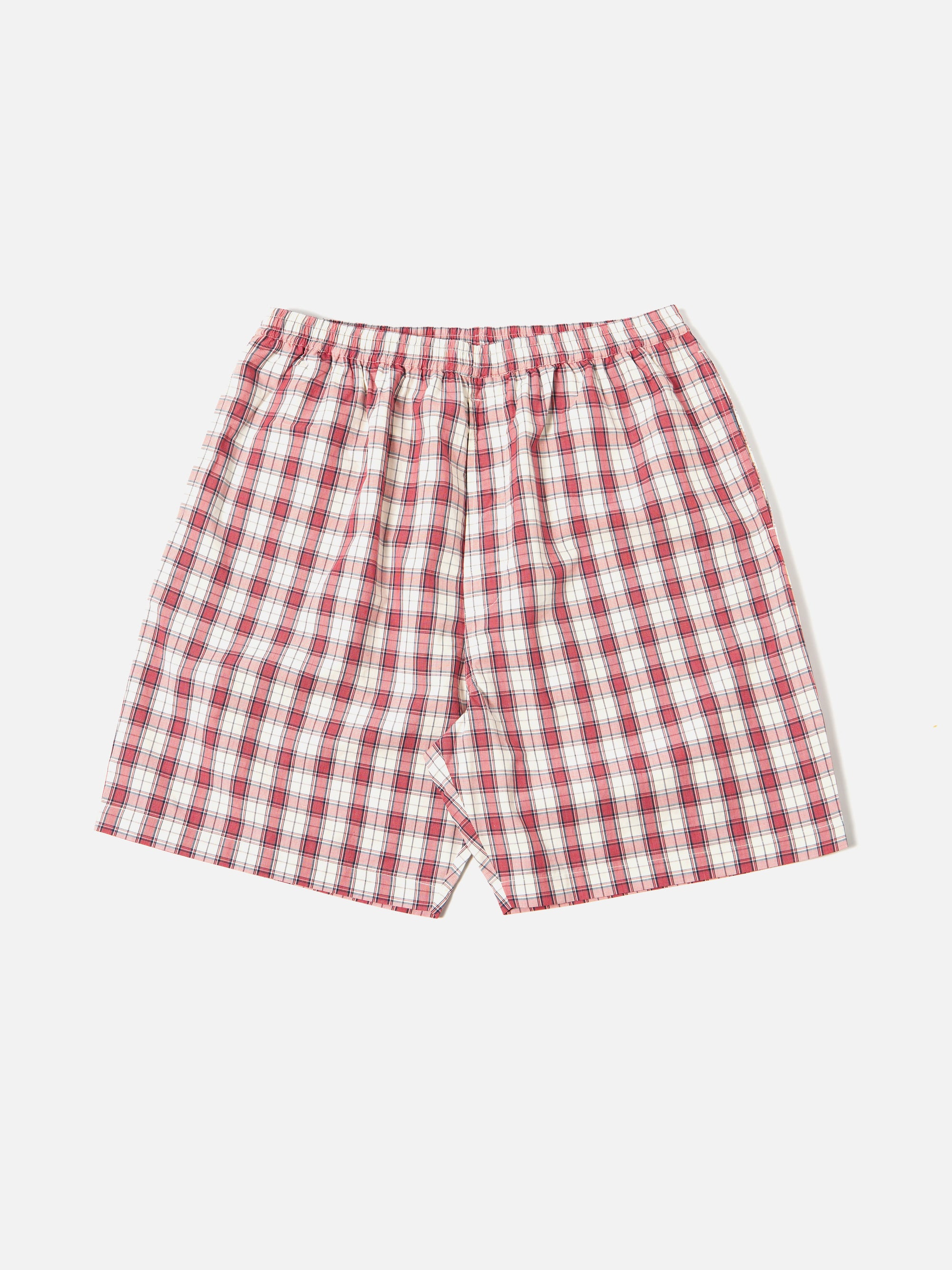 A pair of Red Cotton Check Pyjama Short, laid flat on a white background. The shorts have a red and white checkered pattern and an elastic waistband.