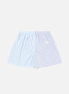 The Blue Classic Mix Boxer Short on a white background. The short is made of blue and white striped and checkered fabric with an elastic waistband.