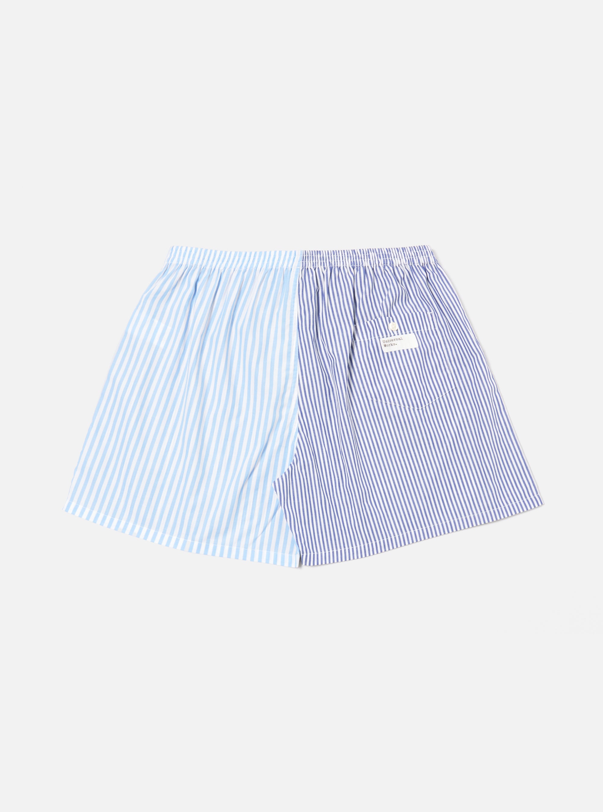 The Blue Classic Mix Boxer Short, displayed on a white background. The short is striped with light and dark blue, featuring an elastic waistband and a small tag.