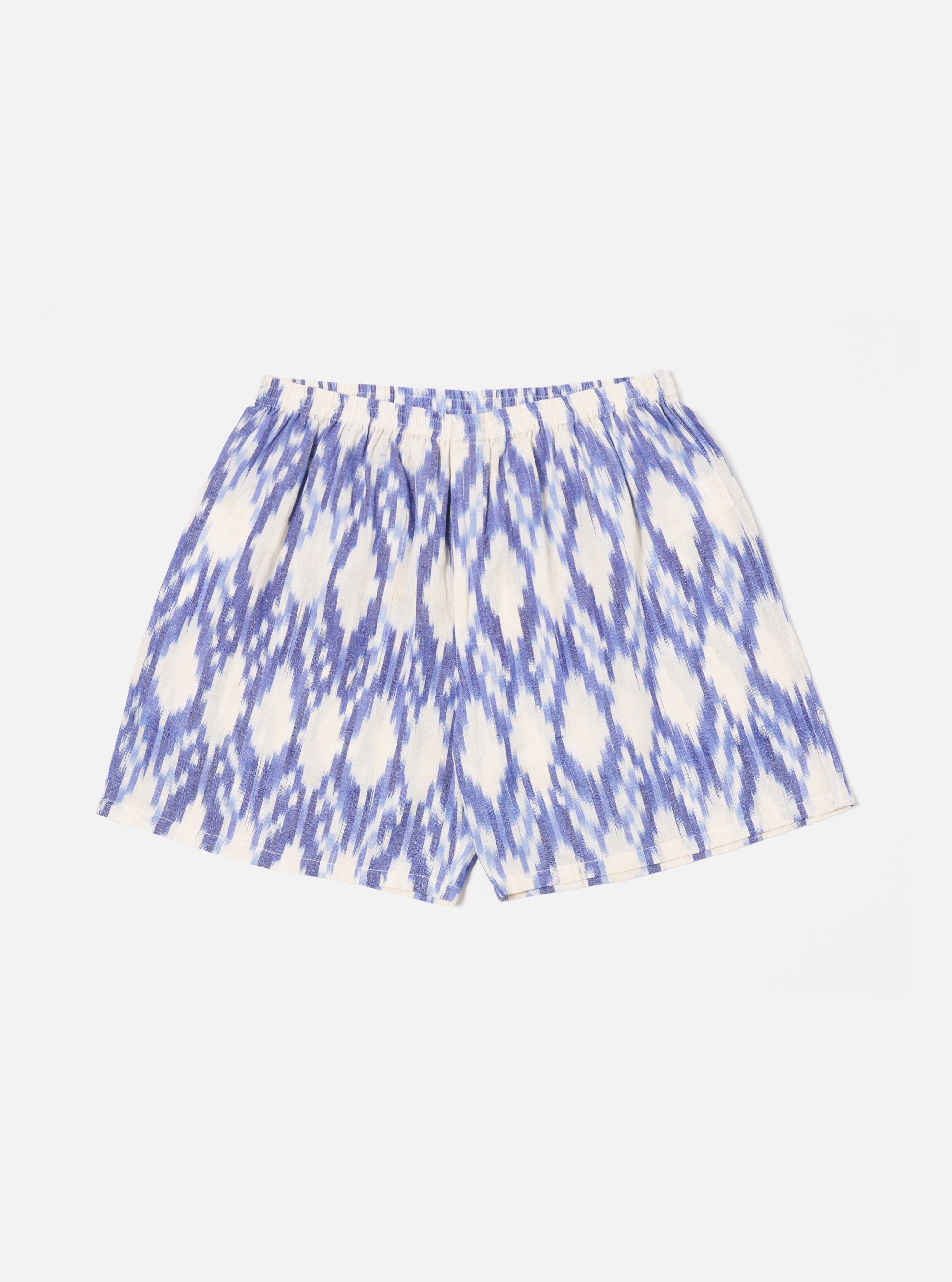 Ecru Ikat I Cotton Boxer Short on a white background. The shorts are cotton with a blue ikat pattern and an elastic waist.