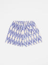 The Ecru Ikat I Cotton Boxer Short on a white background. The shorts are ecru with a blue ikat pattern and have an elastic waistband.