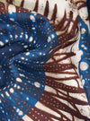 Close-up of the Navy Hokkoh Print Boxer Short fabric. Features a blue, brown, and white pattern. The material is folded, showcasing its texture and design.