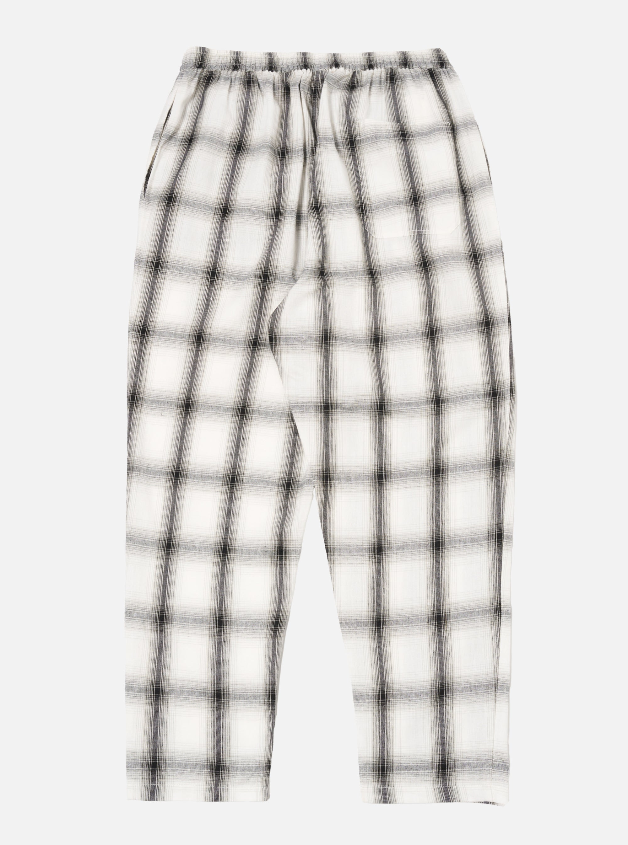 The Ecru Shadow Check Pyjama Pant, displayed on a white background. These relaxed-fit pants feature a subtle shadow check pattern in ecru and gray tones.