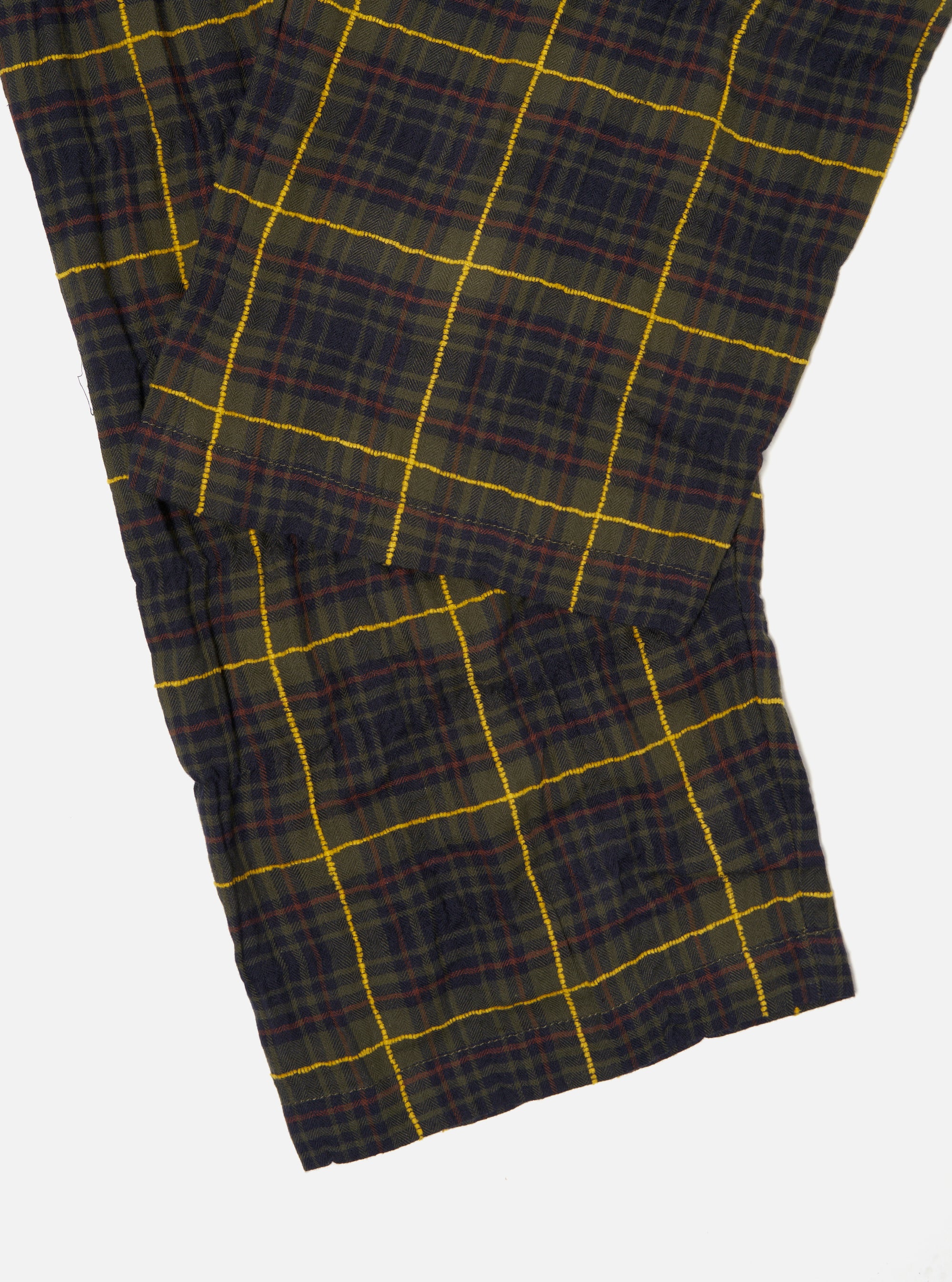 Close-up of the Olive JP Herringbone Check Pyjama Pant on a white background. The fabric is a soft, brushed cotton with a green, navy, and yellow check pattern.