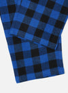 Close-up of the Blue Brushed Bold Gingham Pyjama Pant on a white surface. The brushed cotton fabric features a blue and black gingham pattern.