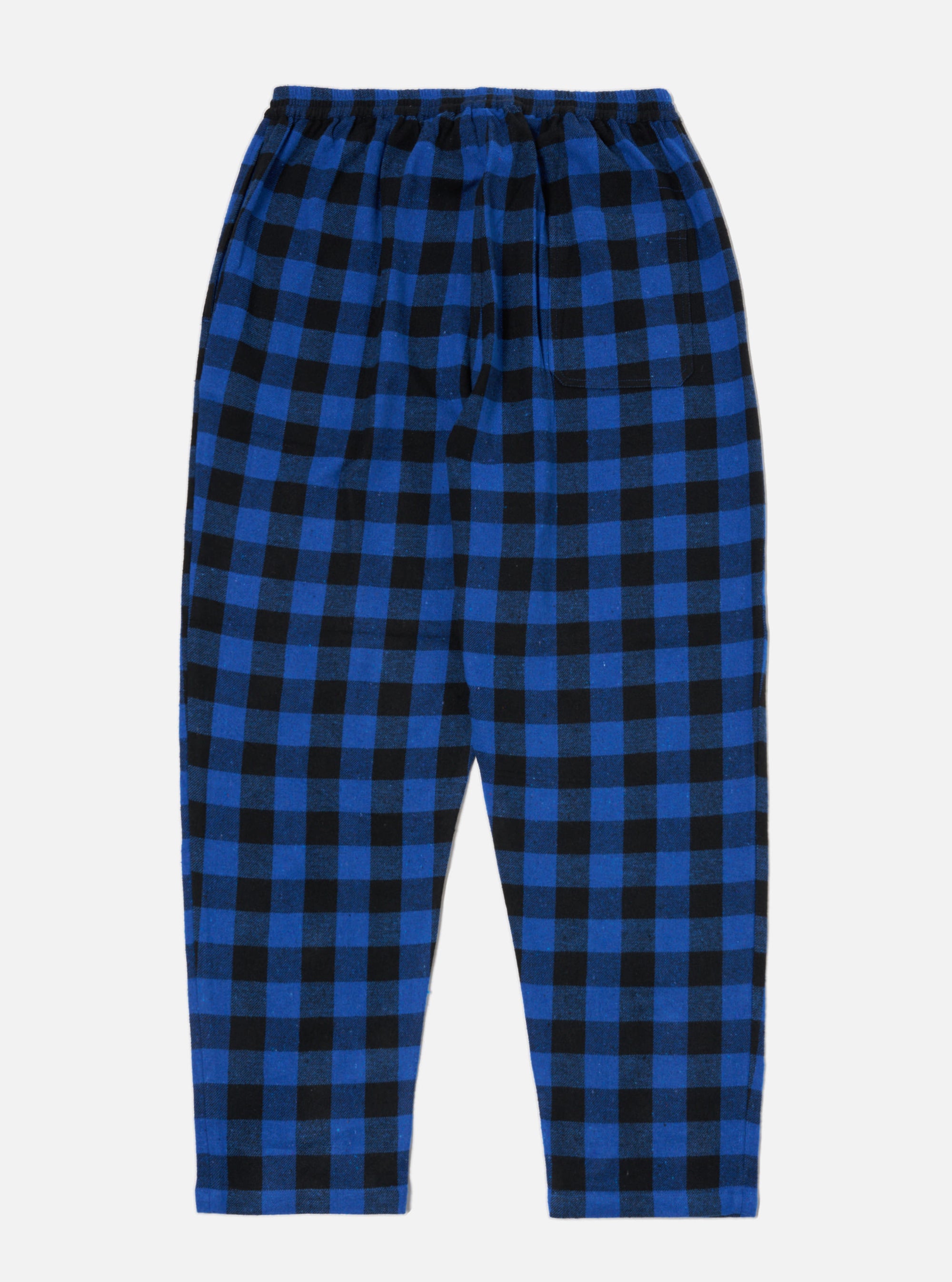 The Blue Brushed Bold Gingham Pyjama Pant on a white background. The pants are blue and black, with an elastic waist and a relaxed fit.