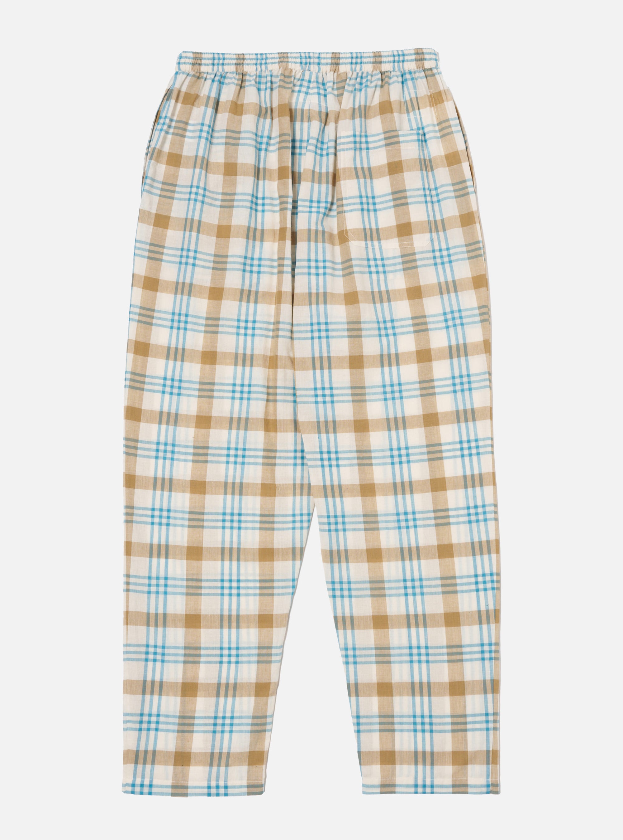 Close-up of the Ecru Madras Check Pyjama Pant on a white background. The pants feature a blue, ecru, and brown plaid pattern and an elastic waistband.