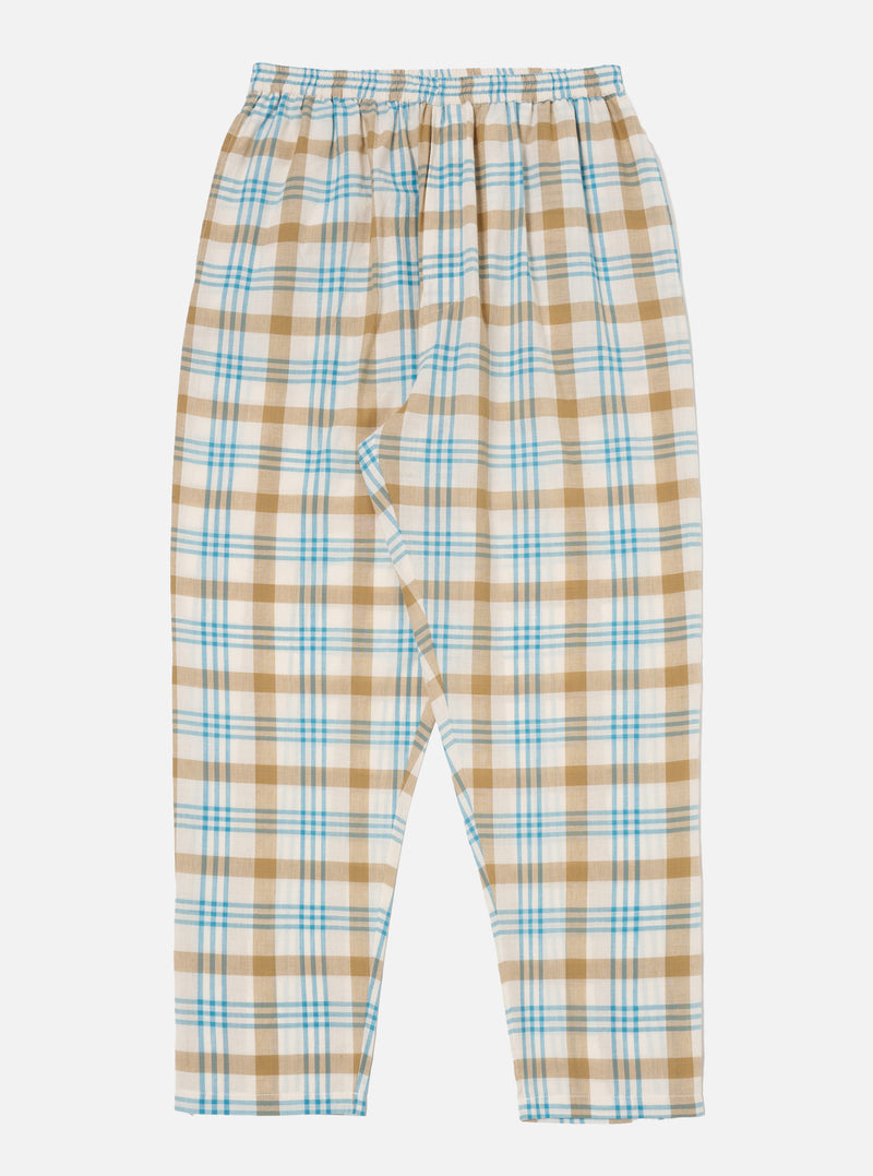 The Ecru Madras Check Pyjama Pant on a white background. The pants are ecru with a blue and brown check pattern and have an elastic waistband.