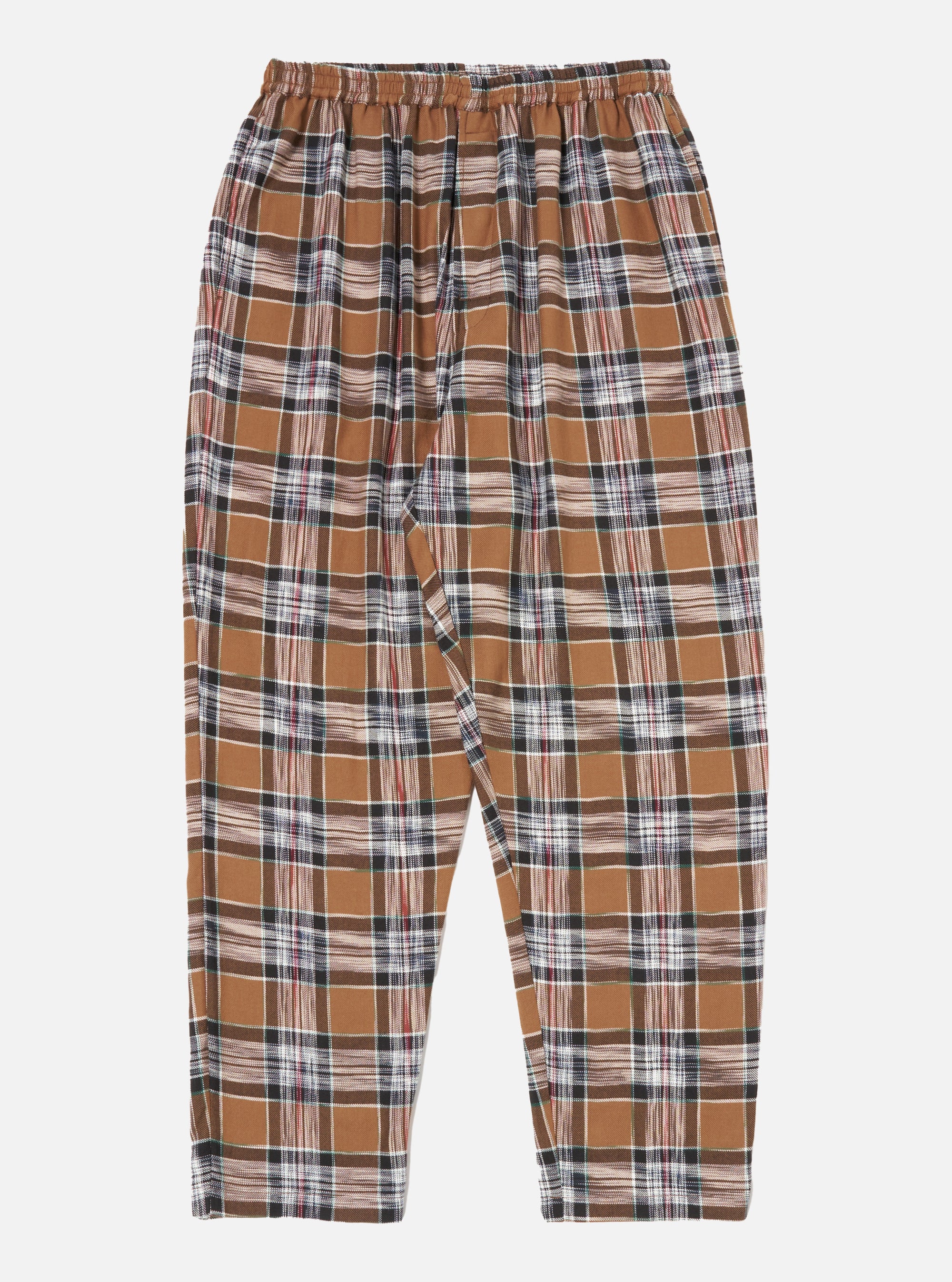 Close-up of the Brown Ikat Twill Check Long Pyjama Set pants on a white background. The brown, black, white, and red plaid pants have an elastic waistband and relaxed fit.