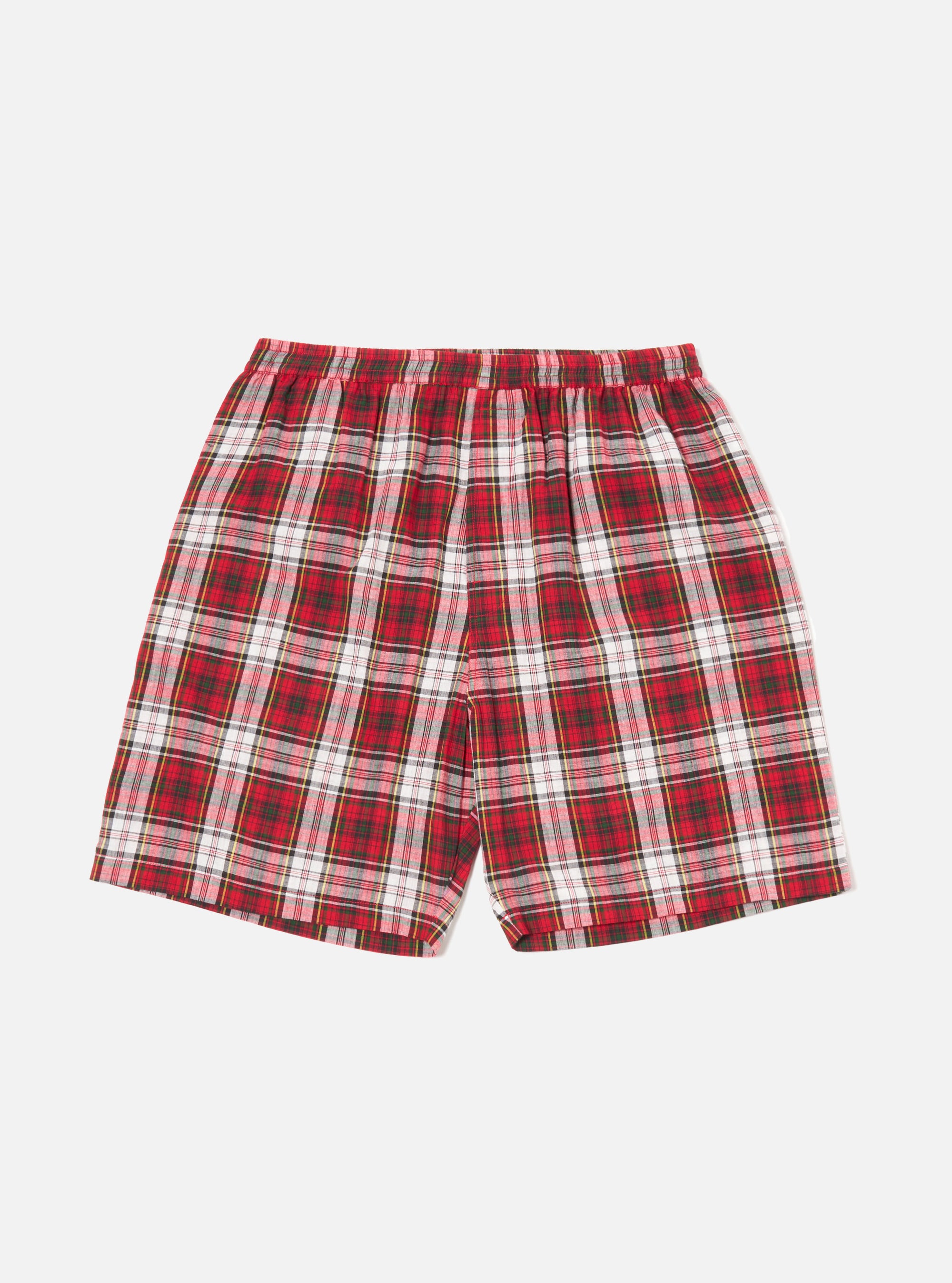Close-up of the Red Madras Check Short Pyjama Set on a white background. The red, white, and green plaid shorts have an elastic waistband.