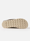 Close-up of the sole of the Zardus for Universal Works Dark Brown Suede Jack. The sole is a light tan color with a zig-zag pattern. The background is a plain white.