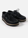 Studio shot of Zardus for Universal Works Black Suede Oliver shoes. The black suede shoes feature white stitching and are set against a clean, white background.