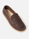 Studio shot of a Zardus for Universal Works Brown Leather Reggie Loafer. The brown leather shoe has white stitching and a light sole. The background is a plain white.