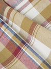 Close-up of the Multi Kip Check 3 Pack Boxer Short fabric. Features a soft, brushed cotton in a multi-colored plaid pattern with red, blue, and tan hues. 