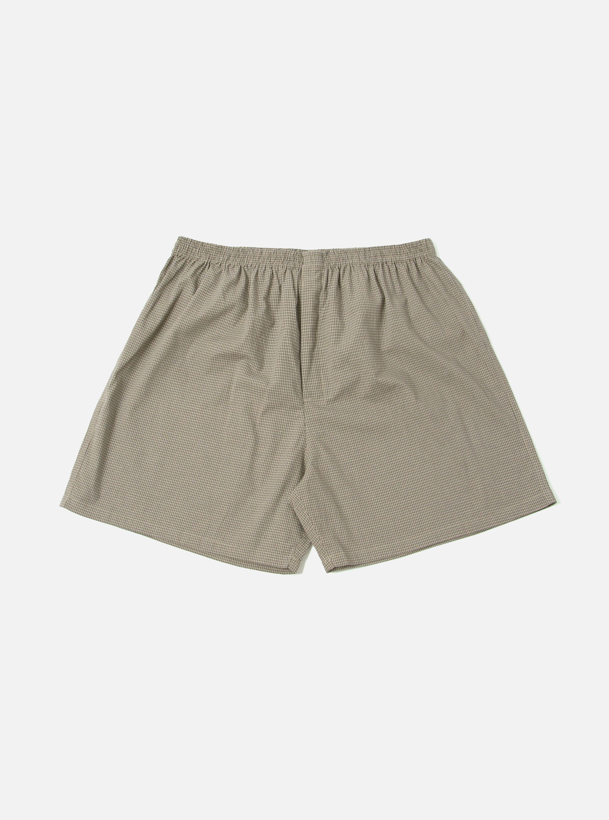 The Green Tiny Check Boxer Short, laid flat on a white background. The boxer shorts have a small green and white check pattern and an elastic waistband.