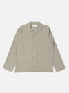 The Green Tiny Check Long Pyjama Set is laid flat on a white background. The set features a subtle green and white check pattern, long sleeves, and button-down front.