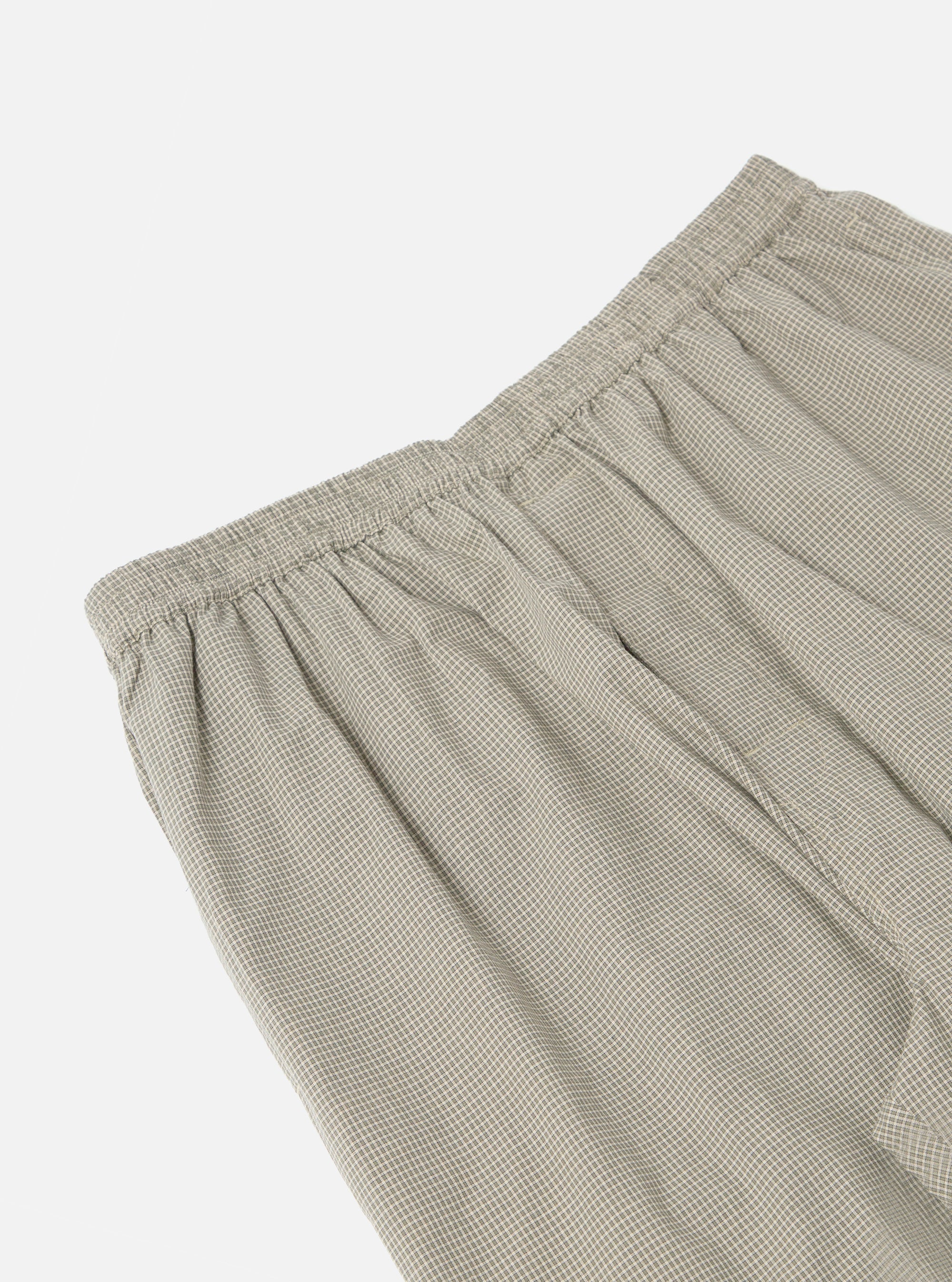 Close-up of the Green Tiny Check Long Pyjama Set pants, showing the elastic waistband and soft, checked fabric on a white background.