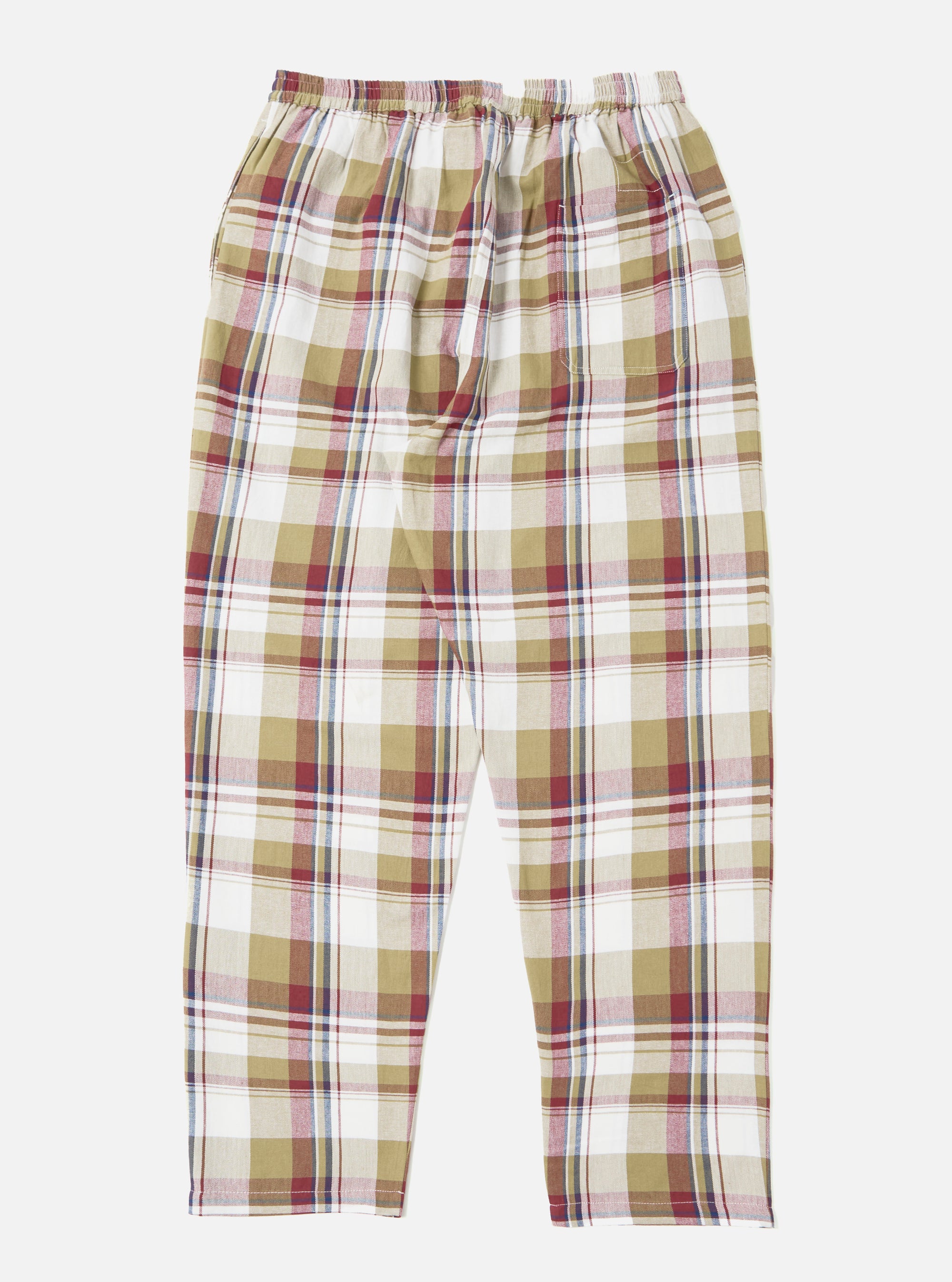 Close-up of the Red/Brown Kip Check Long Pyjama Set pants on a white background. The fabric features a red, brown, and white check pattern. Elasticated waist.