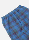 Close-up of the Blue Kip Check Long Pyjama Set pants, showcasing the blue, green, and maroon plaid pattern and elastic waistband on a white background.