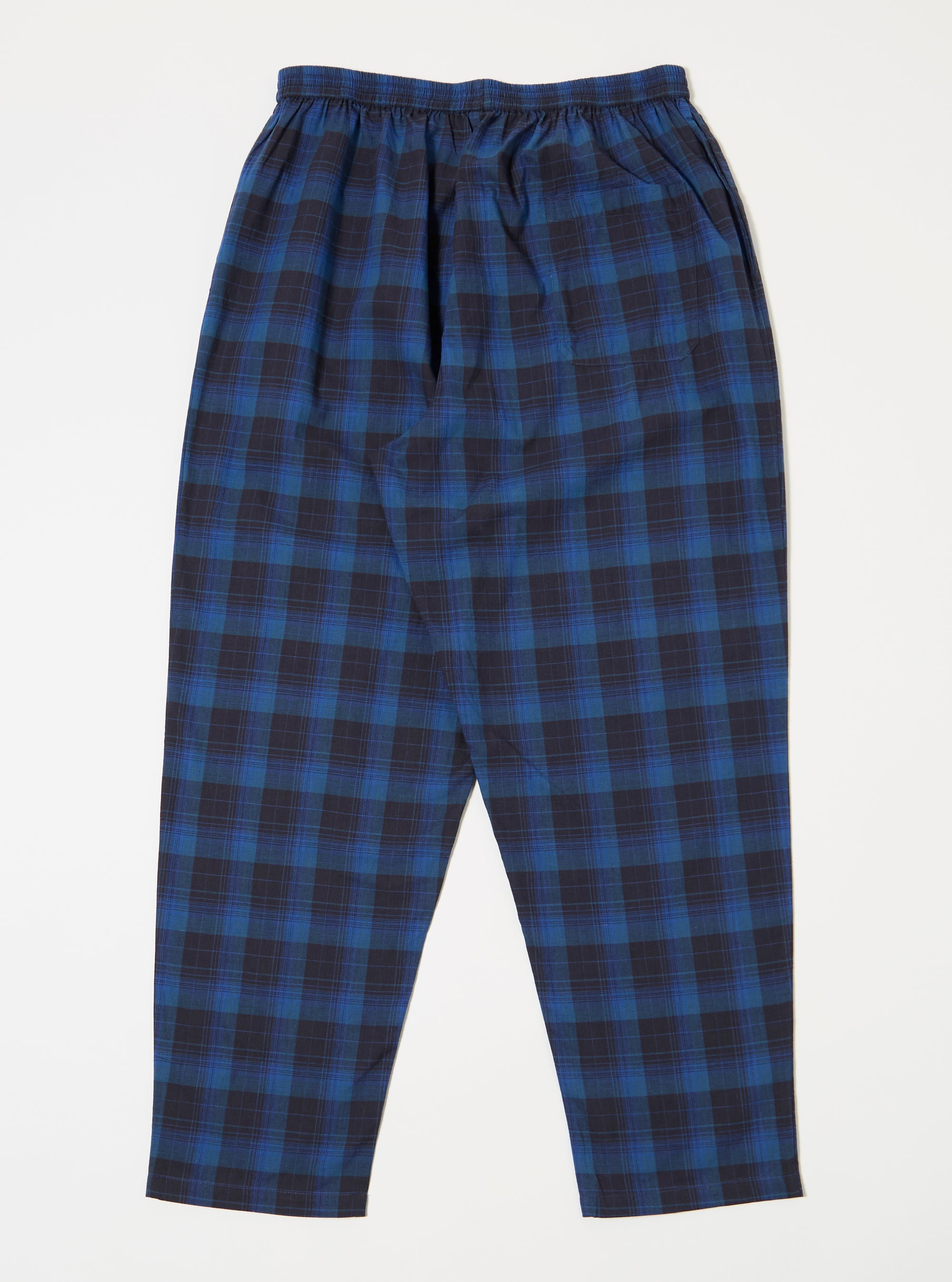 Close-up of the Navy/Blue Check Long Pyjama Set on a white background. The pyjama bottoms feature a blue and navy check pattern and an elasticated waist.