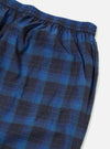 Close-up of the Navy/Blue Check Long Pyjama Set bottoms, showcasing the elastic waistband, pocket, and plaid pattern on a white background.