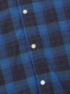 Close-up of the Navy/Blue Check Long Pyjama Set. The fabric is a soft-looking cotton blend with a classic check pattern. White buttons are visible. Shot on a flat surface.