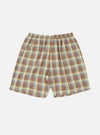 Close-up of the Yellow/Brown Check Short Pyjama Set on a white background. The shorts feature a brown, yellow, and blue plaid pattern with an elastic waistband.