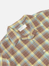 Close-up of the Yellow/Brown Check Short Pyjama Set top on a white background. The shirt features a brown, yellow, and blue plaid pattern with a camp collar and button closure.