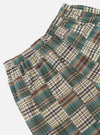Close-up of the Green Patchwork Madras Pyjama Short on a white background. The shorts feature a green, brown, and white plaid patchwork design with an elastic waistband.